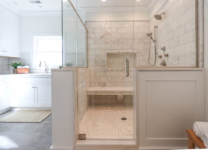 White cabinets, marble tile, shower, grey tile, multiple shower heads