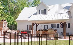 Patio with Stone Fireplace and Outdoor Kitchen